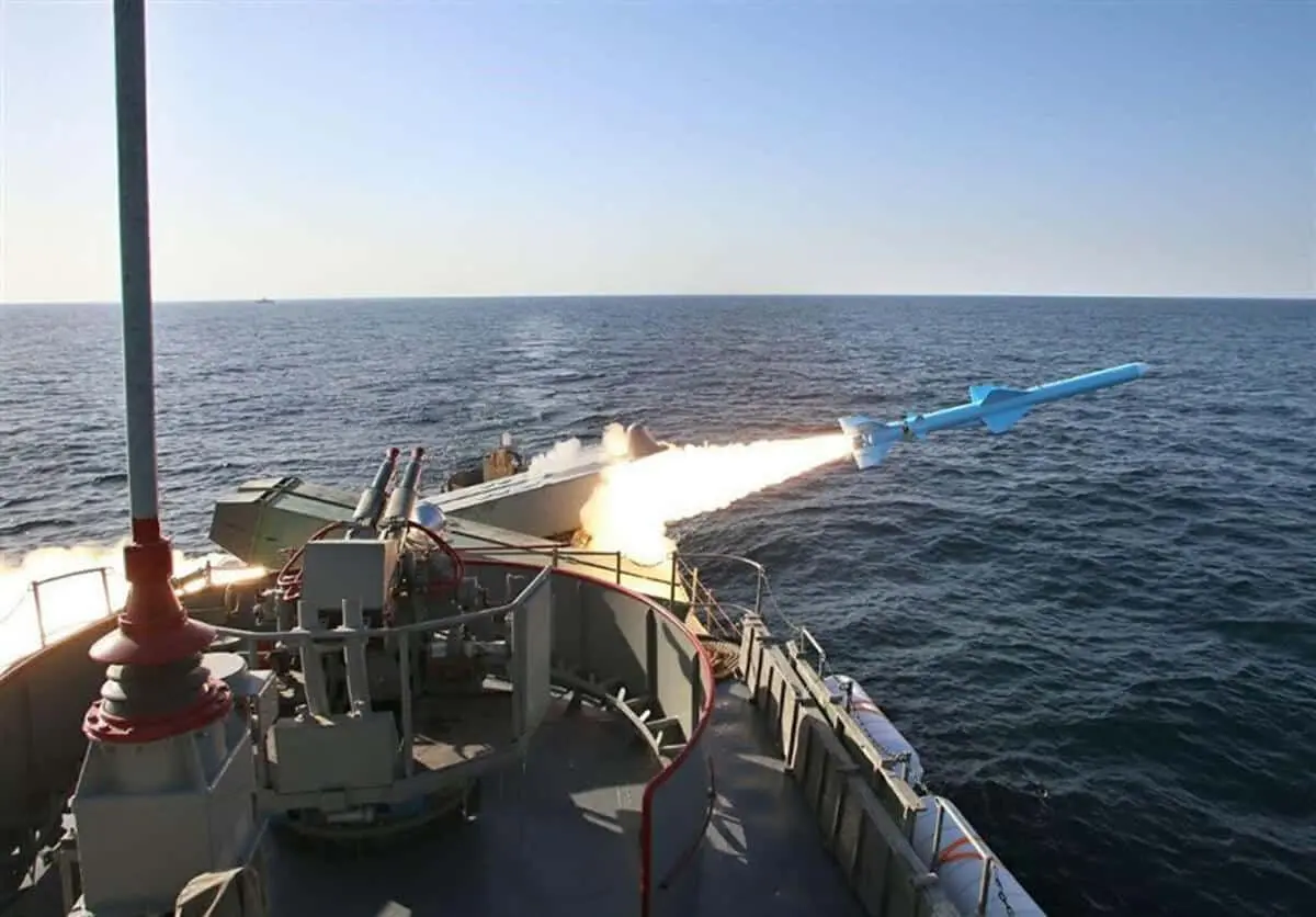 Iran launches cruise missile from submarine during drill