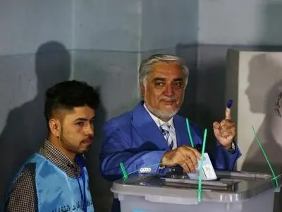 Afghan voters brave attacks as presidential election begins