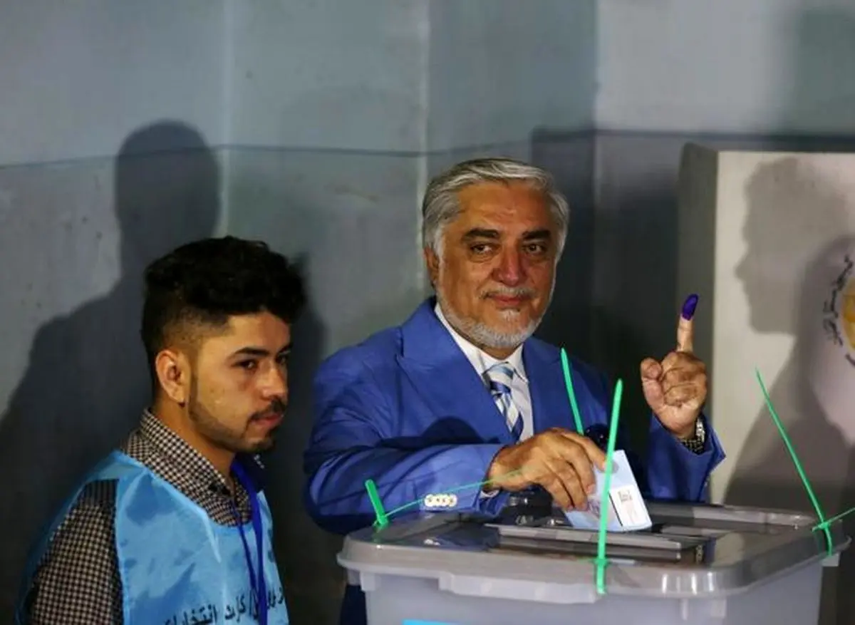 Afghan voters brave attacks as presidential election begins