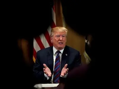 Trump weighs Syria options, Russia envoy says he 'cannot exclude' war
