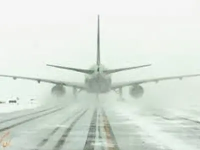 تیک آف جذاب هواپیما در روز برفی/فیلم