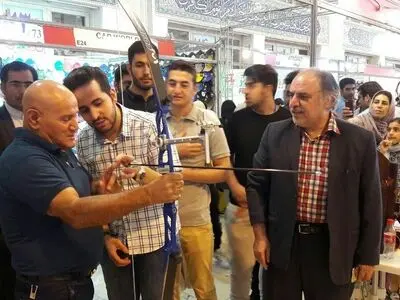 اهدای لوح نمایشگاه بین المللی تجهیزات ورزشی نمایشگاه بین المللی تجهیزات ورزشی با کمان