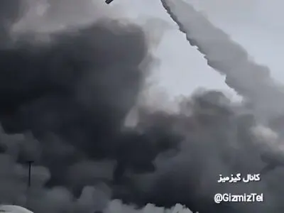 لحظات نفس گیر خاموش کردن آتش بندرعباس از کابین هواپیمای ایلوشین ۷۶ + فیلم