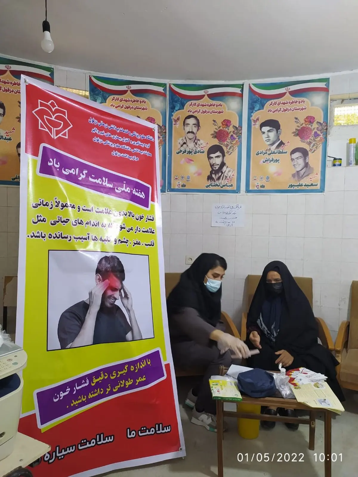ویزیت رایگان کارگران و خانواده هایشان توسط پزشکان مرکز بهداشت دزفول + تصاویر