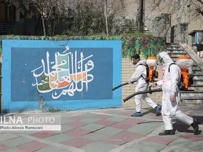 عملیات ضد عفونی معابر اصلی و فرعی خیابان ولیعصر (عج)