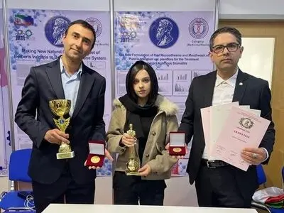 Dr. Bahram Hassani and his colleagues on the Golden Platform of the Archimedes International Inventions Competition.