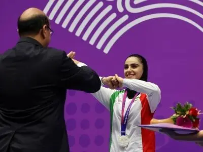 کریمی: کیانی برای مدال طلا جنگید/ داوران لغزش بازیکن چین را ندیدند
