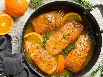 طرز تهیه مرغ پرتقالی با زرشک پلوی زعفرانی 