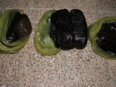 کشف بسته پستی تریاک و شیشه در کرمانشاه