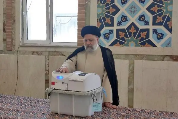 President Raeisi casts vote for parliament elections runoff