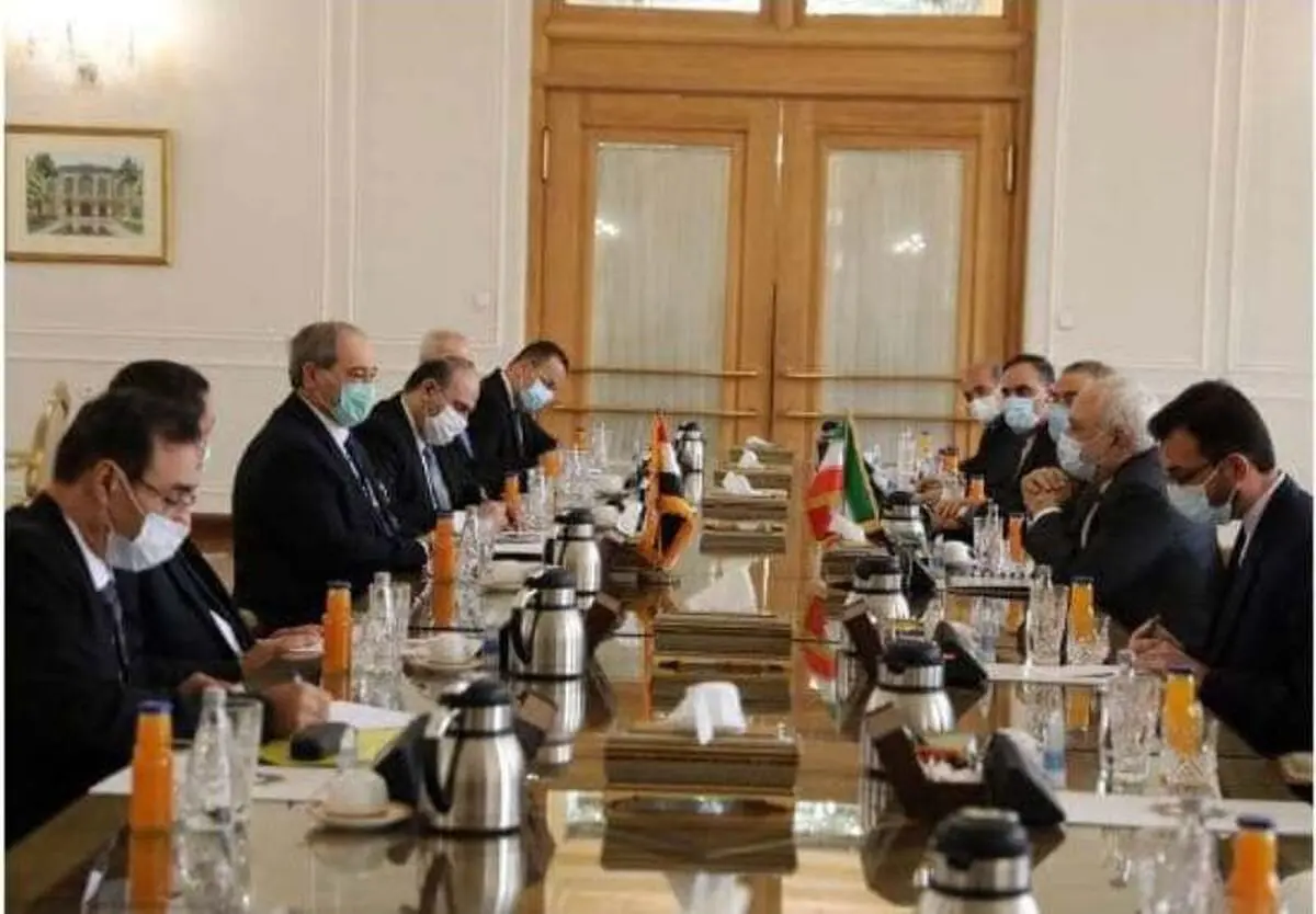 انطلاق الجولة الأولى من المباحثات بین وزیری الخارجیة الإیرانی والسوری 