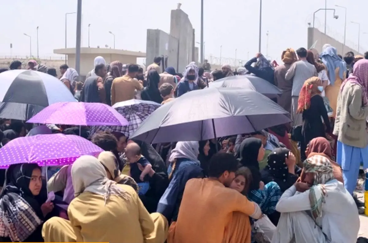 Chaos and violence as crowds keep growing outside Kabul airport