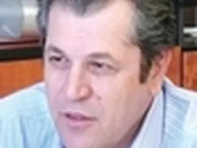 منزوی، مشاور بین‌المللی فتح‌الله‌زاده شد