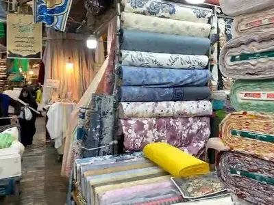 راسته پارچه‌فروش‌ها در بازار تهران در دوران ناصرالدین‌شاه+ عکس