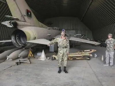Libya gov't vows response after base hit by 'foreign air force'