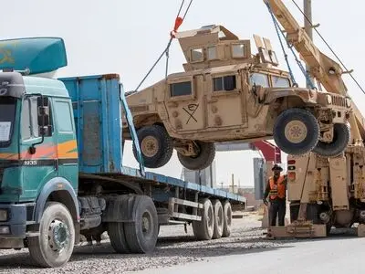 Era ends, uncertainty looms as U.S. forces quit main Afghanistan base