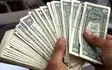 کشف بیش از 4 میلیون دلار تقلبی در ساوه / 8 نفر از اعضای باند سازمان‌یافته جعل و توزیع دلارهای تقلبی دستگیر شدند