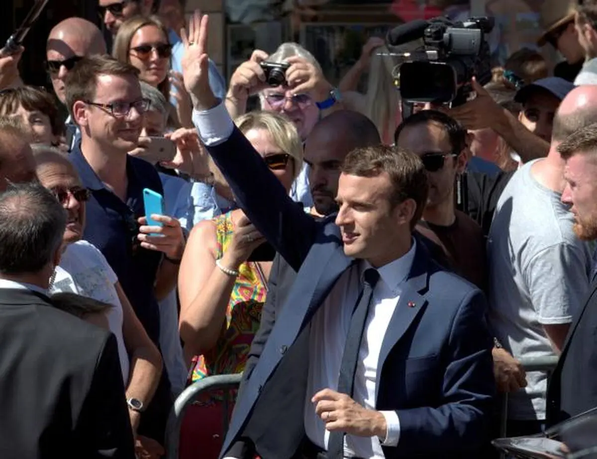 Macron wins strong parliamentary majority, estimates show