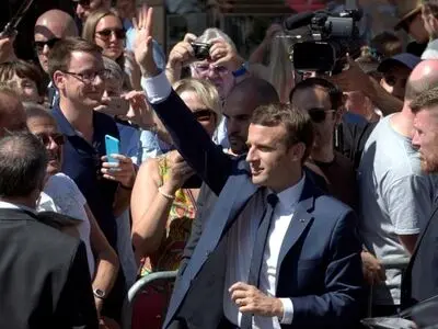Macron wins strong parliamentary majority, estimates show
