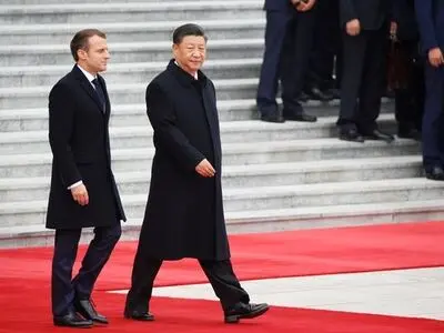 China and France sign deals worth $15 billion during Macron's visit