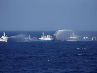 U.S. navy ship sails in disputed South China Sea amid trade talks with Beijing