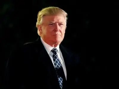 Backing down, Trump agrees to end shutdown without border wall money